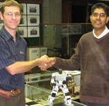(Left to right) Presenter Johannes de Vries, Tshwane University of Technology; unnamed robot; SAIMC Durban branch chairman Vinesh Maharaj